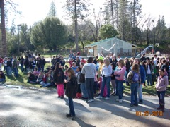 Students grouped together outside participating in an unspecified event